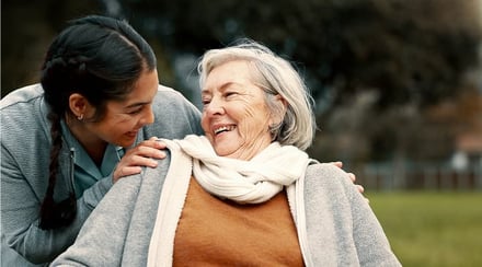 caregiver_helping_woman